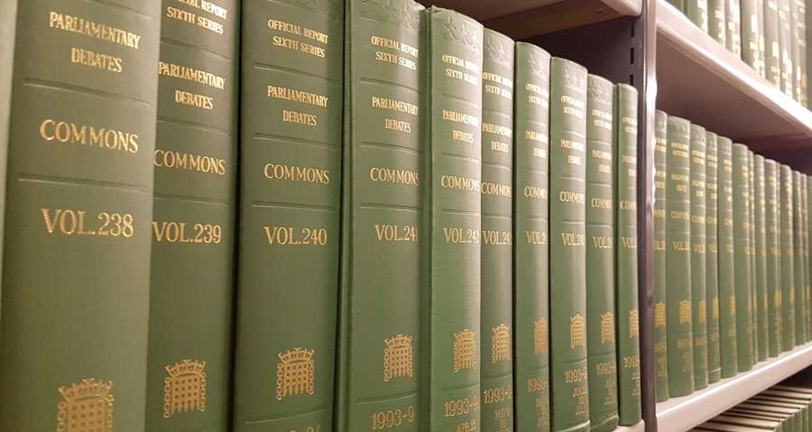 Photo of hansard books on bookshelf