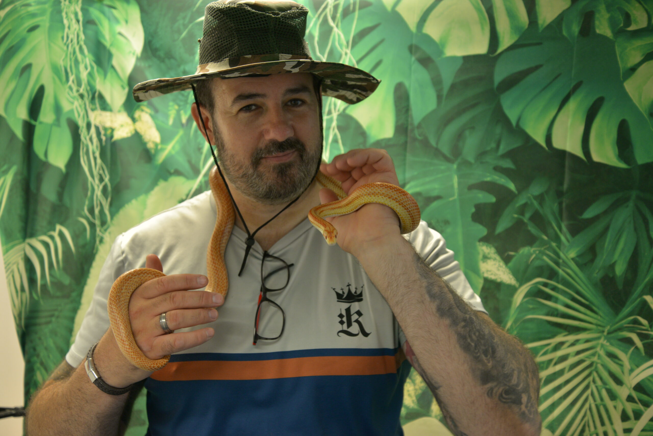 Martin holding corn snake